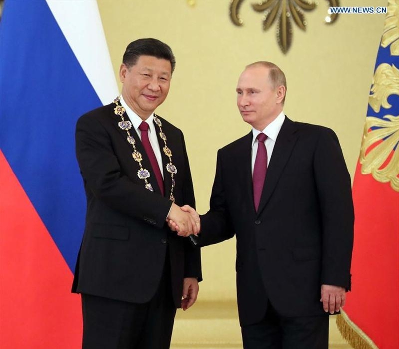 This image has an empty alt attribute; its file name is PUTIN-AND-XI.jpeg